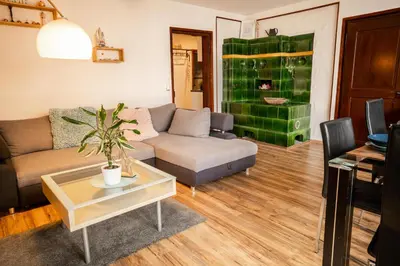 Ein Sitzbereich in der Unterkunft Apartments am See
