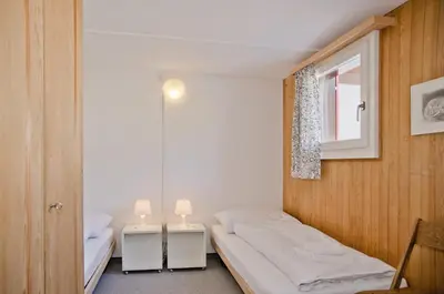 Ein Bett oder Betten in einem Zimmer der Unterkunft Apartment Nussbaum - GRIWA RENT AG