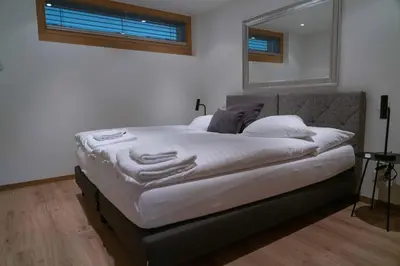 Ein Bett oder Betten in einem Zimmer der Unterkunft Meric Apartment