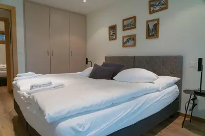 Ein Bett oder Betten in einem Zimmer der Unterkunft Meric Apartment