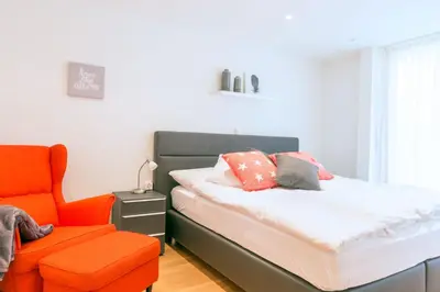 Ein Bett oder Betten in einem Zimmer der Unterkunft Meric Apartment