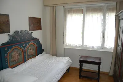 Ein Bett oder Betten in einem Zimmer der Unterkunft CRANS MONTANA LE REGENT APPARTEMENT