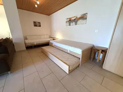 Ein Bett oder Betten in einem Zimmer der Unterkunft Salute 117
