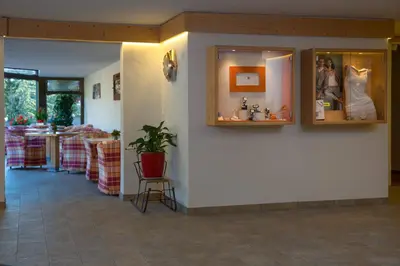 Ein Restaurant oder anderes Speiselokal in der Unterkunft Hotel Helvetia Intergolf