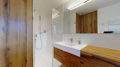 Ein Badezimmer in der Unterkunft Haus Marietta - Leukerbad