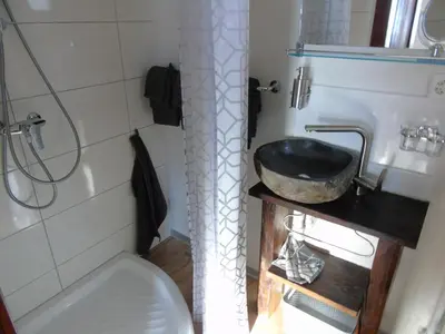 Ein Badezimmer in der Unterkunft Room's chez BeNi