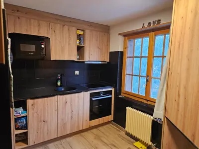Küche/Küchenzeile in der Unterkunft Le Panorama - Appartement 54 à Arolla face aux montagnes à 150m des pistes