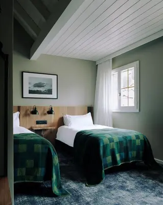 Ein Bett oder Betten in einem Zimmer der Unterkunft The Cambrian
