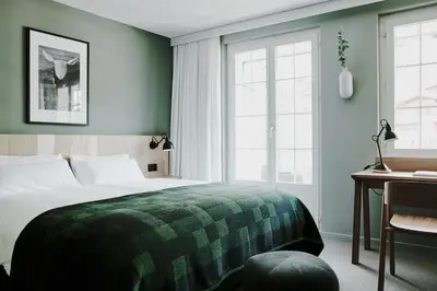 Ein Bett oder Betten in einem Zimmer der Unterkunft The Cambrian