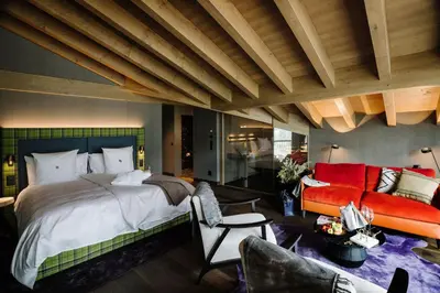 Ein Bett oder Betten in einem Zimmer der Unterkunft Bergwelt Grindelwald - Alpine Design Resort