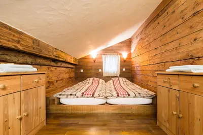 Ein Bett oder Betten in einem Zimmer der Unterkunft Mayen2003 Ayent Anzère