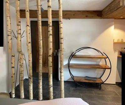 Ein Bett oder Betten in einem Zimmer der Unterkunft Mountainsuite