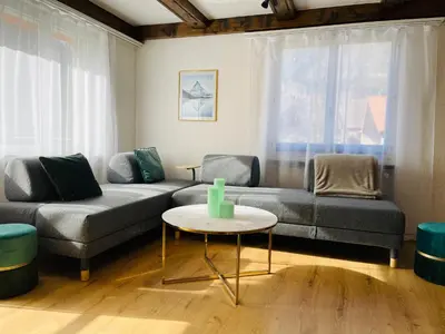 Ein Sitzbereich in der Unterkunft S&P Mountain View Apartment 1