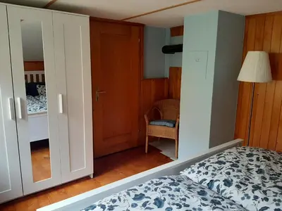 Ein Bett oder Betten in einem Zimmer der Unterkunft Chalet Am Fels