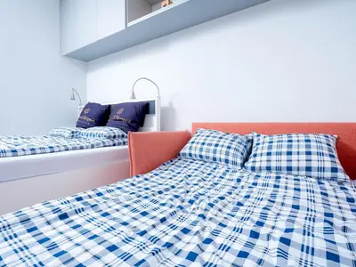 Ein Bett oder Betten in einem Zimmer der Unterkunft Cozy modern Studio super location feels like home