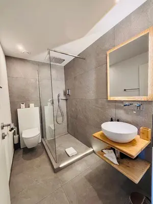 Ein Badezimmer in der Unterkunft Typically Swiss Hotel Ermitage