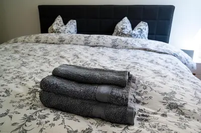 Ein Bett oder Betten in einem Zimmer der Unterkunft Residenz Panorama - Blatten bei Naters VS