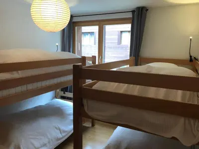 Ein Bett oder Betten in einem Zimmer der Unterkunft Au Pied des Pistes B 04
