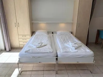 Ein Bett oder Betten in einem Zimmer der Unterkunft Salute 106