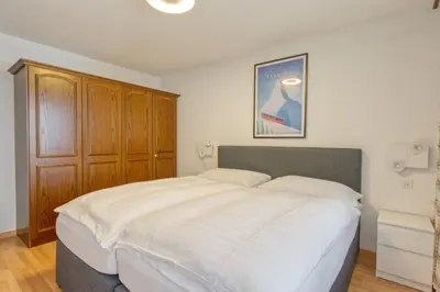 Ein Bett oder Betten in einem Zimmer der Unterkunft Two Bedroom Apartment - Matterhorn view