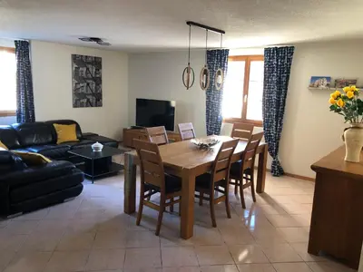 Ein Sitzbereich in der Unterkunft Auberge Les Rangs