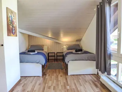 Ein Bett oder Betten in einem Zimmer der Unterkunft Apartment Belvedere by Interhome