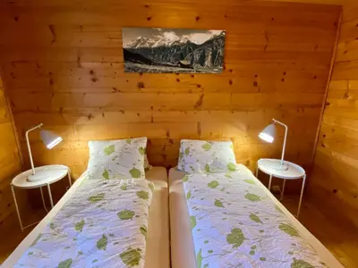 Ein Bett oder Betten in einem Zimmer der Unterkunft Apartment Chalet Jungtalblick Eggeri by Interhome