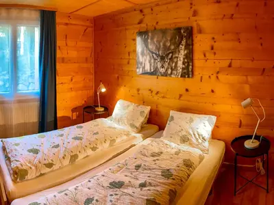 Ein Bett oder Betten in einem Zimmer der Unterkunft Apartment Chalet Jungtalblick Chilcheri by Interhome