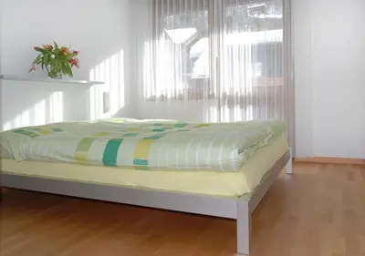 Ein Bett oder Betten in einem Zimmer der Unterkunft Apartment Everest