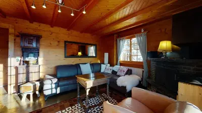 Ein Sitzbereich in der Unterkunft Apartment at the bottom of the slopes in Crans-Montana, cosy atmosphere