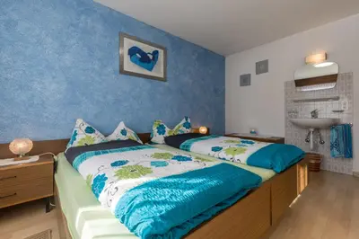 Ein Bett oder Betten in einem Zimmer der Unterkunft Haus Viola
