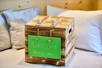 Ein Bett oder Betten in einem Zimmer der Unterkunft Apart Hotel Adelboden am Dorfplatz