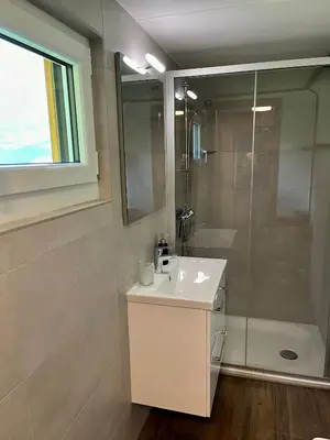 Ein Badezimmer in der Unterkunft Chalet Sonnenheim mit atemberaubender Aussicht