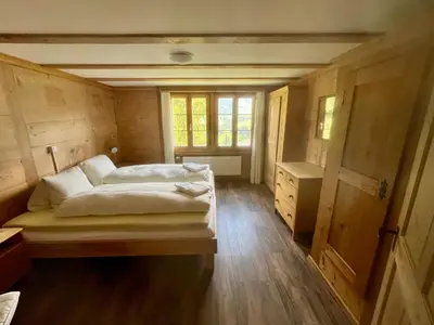 Ein Bett oder Betten in einem Zimmer der Unterkunft Chalet Sonnenheim mit atemberaubender Aussicht