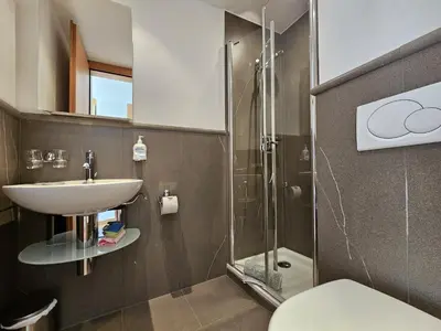 Ein Badezimmer in der Unterkunft Aramis Lodge