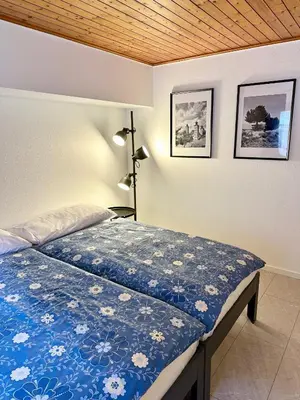 Ein Bett oder Betten in einem Zimmer der Unterkunft Zimmervermietung Ackersand
