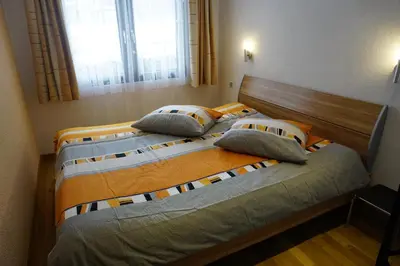 Ein Bett oder Betten in einem Zimmer der Unterkunft Aristella