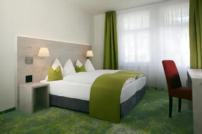 Ein Bett oder Betten in einem Zimmer der Unterkunft Hotel Restaurant Bellevue au Lac