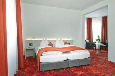 Ein Bett oder Betten in einem Zimmer der Unterkunft Hotel Restaurant Bellevue au Lac