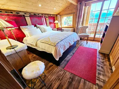 Ein Bett oder Betten in einem Zimmer der Unterkunft Chalet familial traditionnel