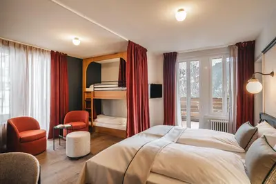 Ein Bett oder Betten in einem Zimmer der Unterkunft Braunbär Hotel & Spa