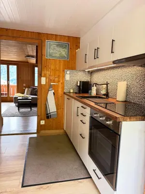 Küche/Küchenzeile in der Unterkunft Charmant Chalet mit See und Bergsicht