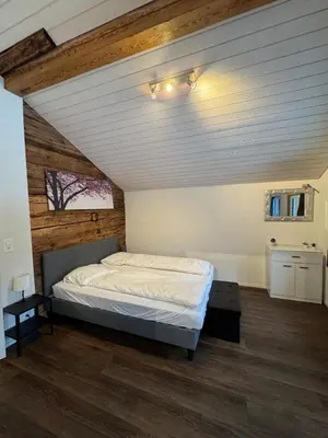 Ein Bett oder Betten in einem Zimmer der Unterkunft Comfortable chalet close to ski slopes