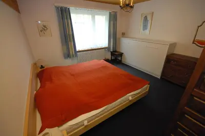 Ein Bett oder Betten in einem Zimmer der Unterkunft Apollo 19