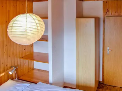 Ein Bett oder Betten in einem Zimmer der Unterkunft Chalet Chalet Enfin by Interhome
