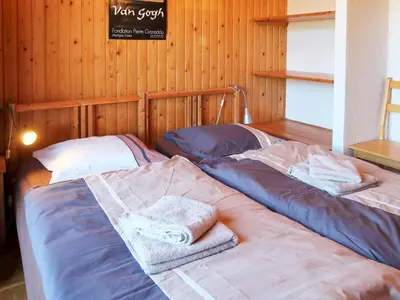 Ein Bett oder Betten in einem Zimmer der Unterkunft Chalet Chalet Enfin by Interhome