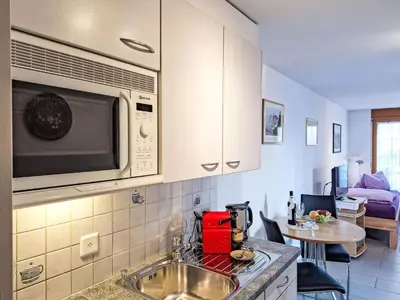 Küche/Küchenzeile in der Unterkunft Apartment Chalet am Reeti by Interhome