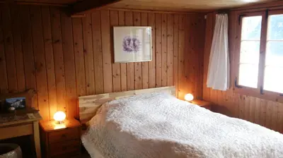 Ein Bett oder Betten in einem Zimmer der Unterkunft Breitmoos