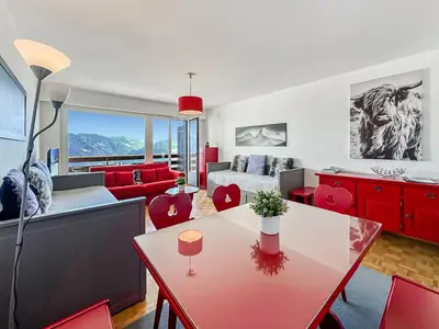 Ein Sitzbereich in der Unterkunft Pied-à-terre in Crans-Montana, pool and view - Swiss Alps