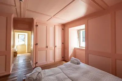 Ein Bett oder Betten in einem Zimmer der Unterkunft Hotel Restaurant Stockalperturm